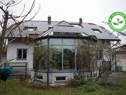Haus mit Wintergarten und Solarzellen. Foto: Hans Nebois