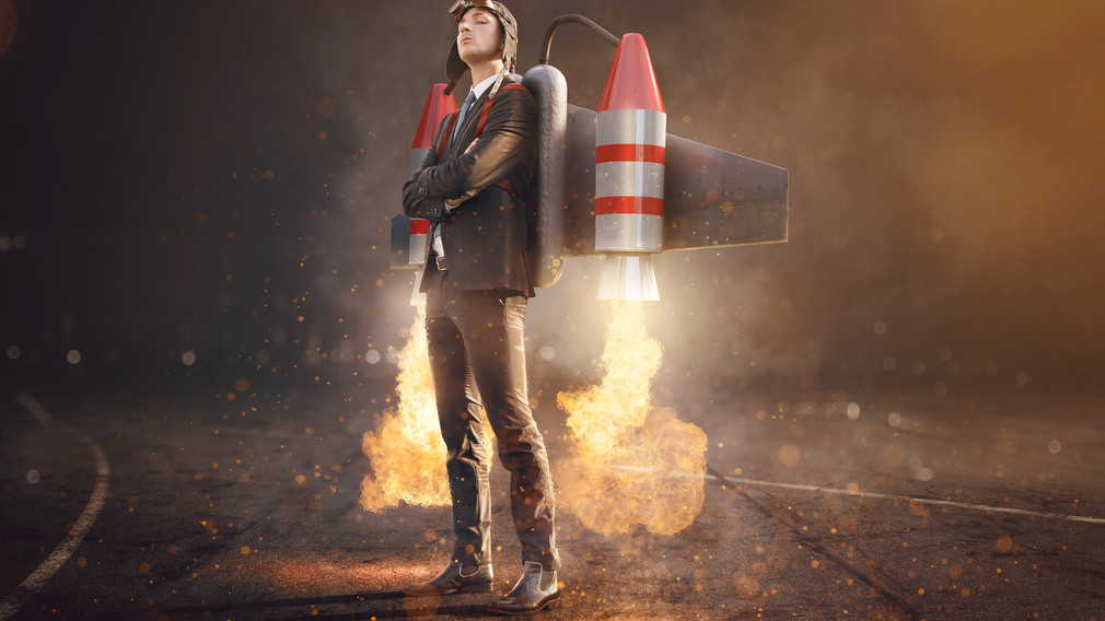 Ein Symbolfoto von einem Mann im Anzug mit Jetpack auf dem Rücken. (Foto: lassedesignen/stock.adobe.com)